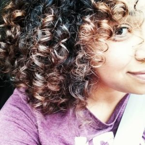 woman with curly hair Providence Moms Blog
