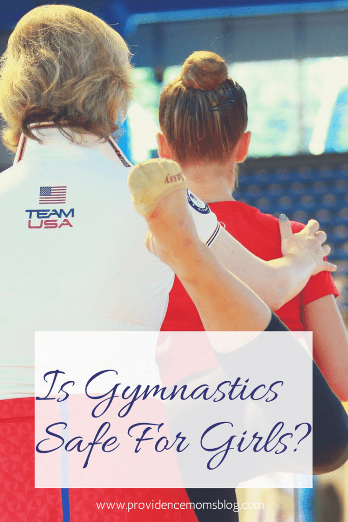 gymnastic coach with student Providence Moms Blog